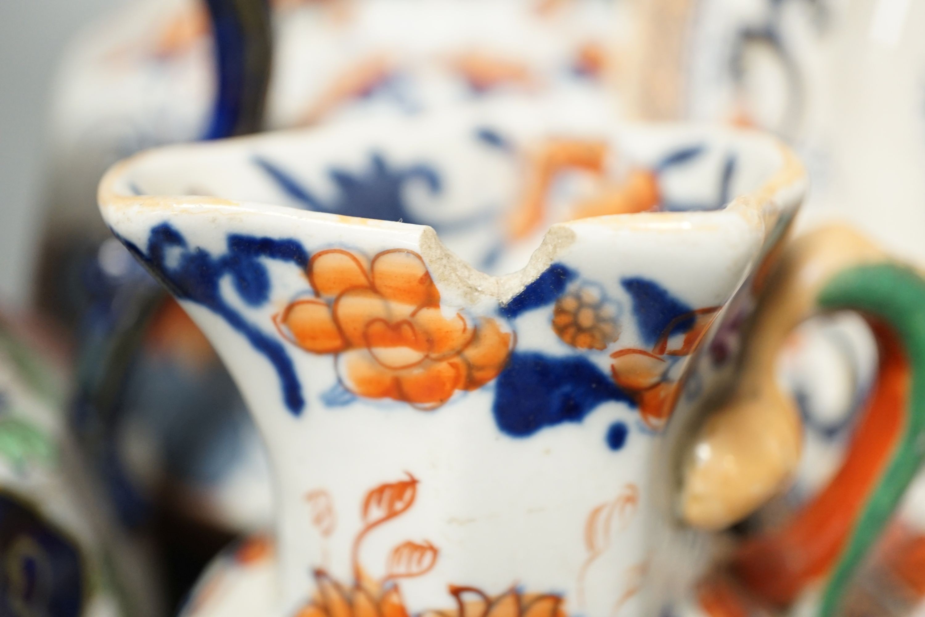 Four graduated Mason’s hydra jugs, tallest 19cm., and eight various ironstone or earthenware plates